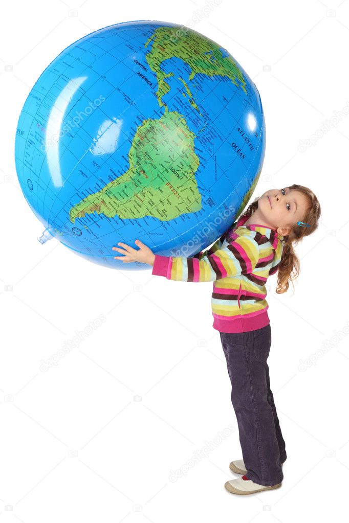 Little girl standing and holding big inflatable globe over her h