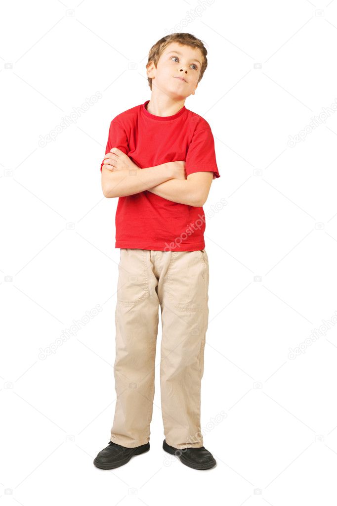 Little boy in red shirt crossed hands standing on white backgrou Stock