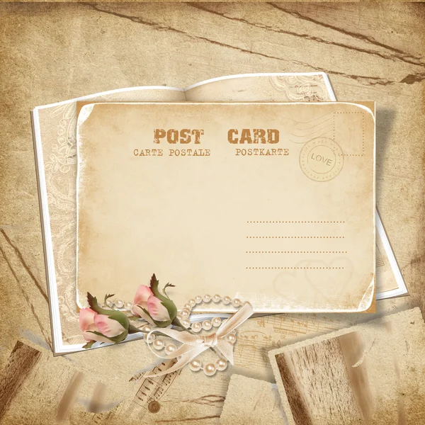 Fondo vintage con una tarjeta y rosas — Foto de Stock