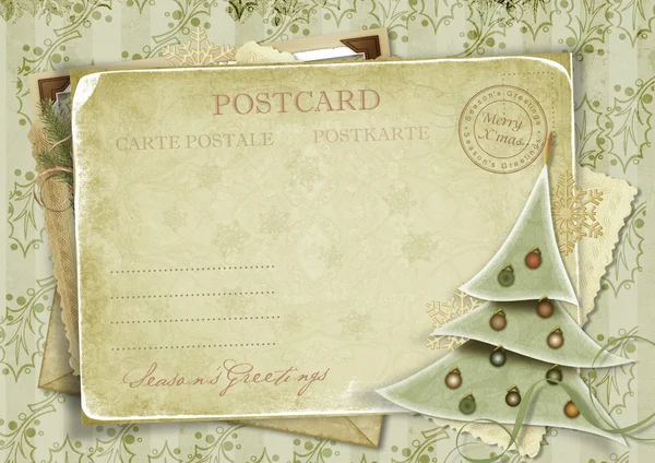 Fundo vintage com cartão postal e árvore de Natal — Fotografia de Stock