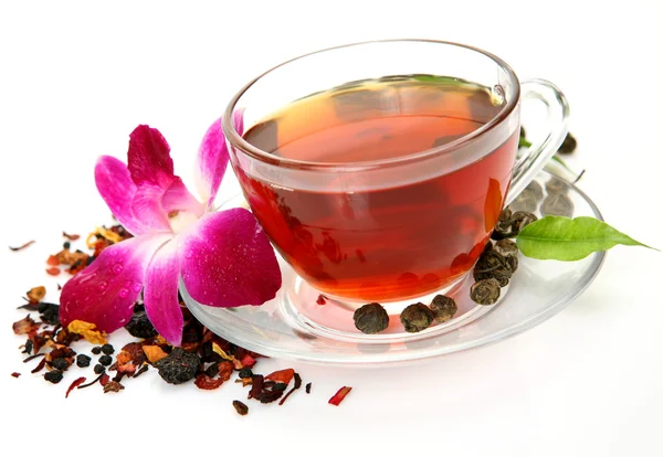 Tea and pink orchid — Stock Photo, Image