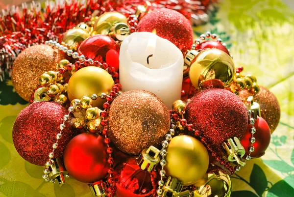 Christmas balls and candle — Stock Photo, Image