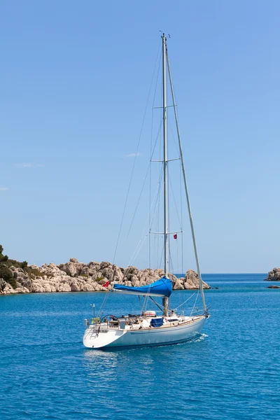 stock image White sailboat in turkish bay