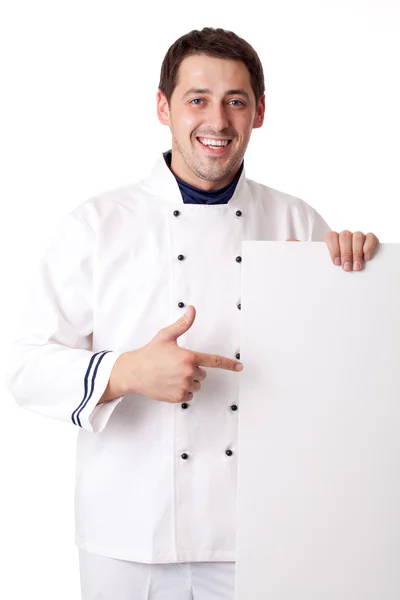 Chef cocinero mostrando a bordo en blanco . —  Fotos de Stock