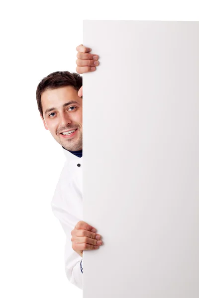 Male chef holding blank board — Stock Photo, Image