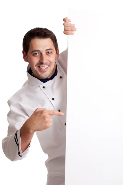Chef cook showing at blank board — Stock Photo, Image