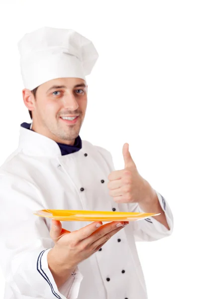 Chef holding plate with something — Stock Photo, Image