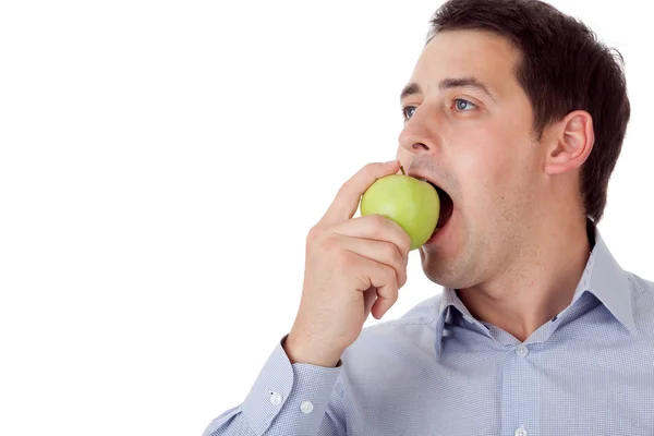 Людина з зеленим яблуком . — стокове фото