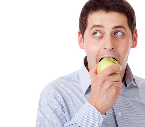 Man met groene appel. — Stockfoto