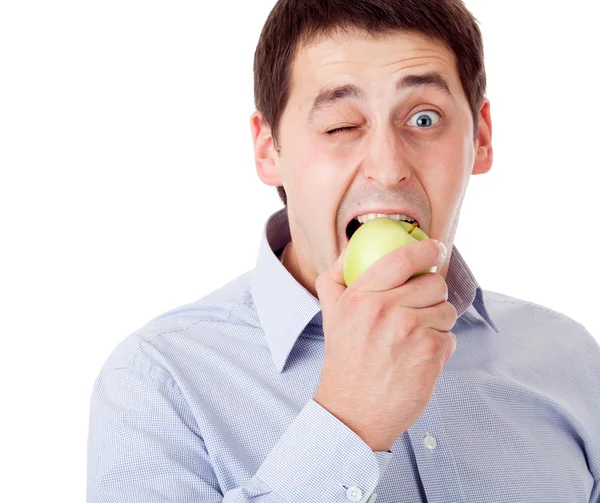 Ember zöld almával. — Stock Fotó