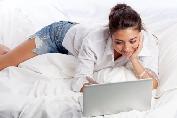 Woman with laptop Stock Picture