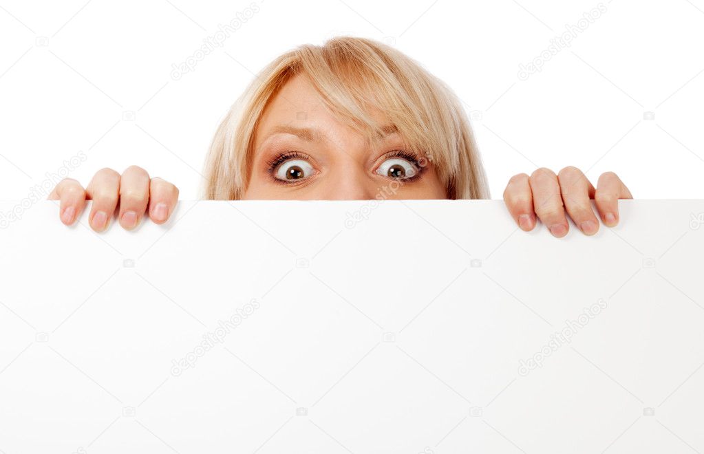 Beautiful woman looking surprised and scared
