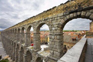 The antique aqueduct and ancient Segovia clipart