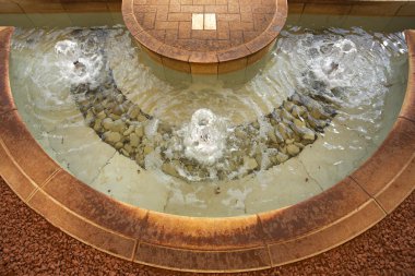Red marble and a graceful fountain clipart