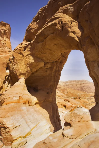 Erosive arch in hills from red sandstone — Stock Photo, Image
