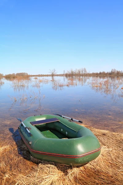 Rubber boat on big lake — Stock Photo, Image