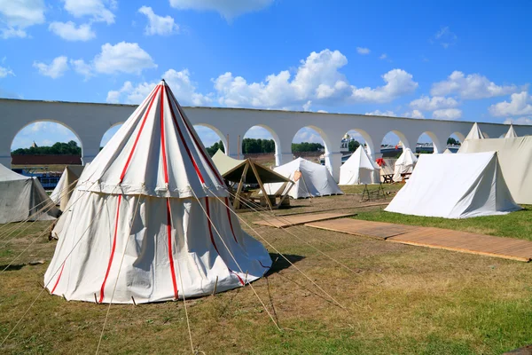 stock image White tents near ancient wall