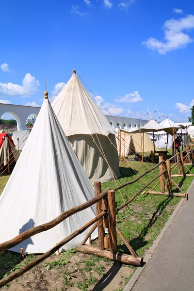 stock image White tents near ancient wall