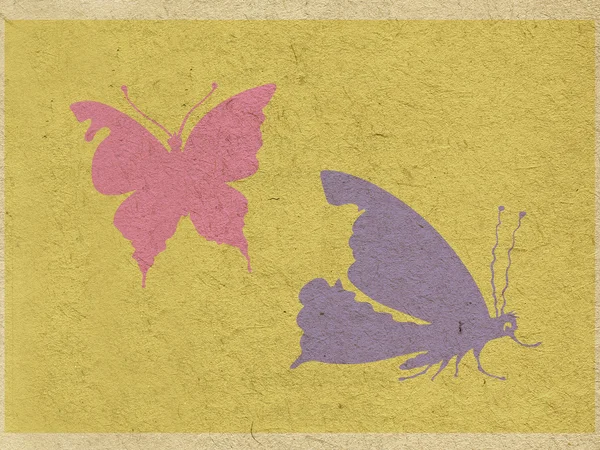 Dva motýli na pozadí grunge — Stock fotografie
