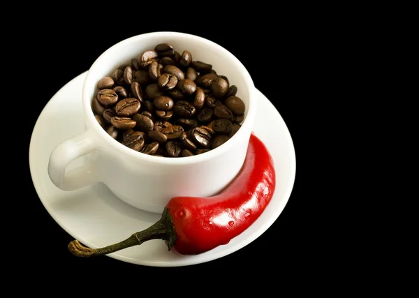Coffee and red pepper Royalty Free Stock Images