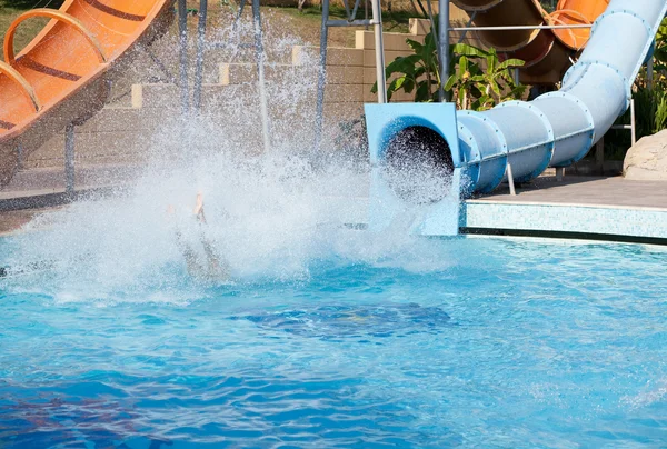 Man riding a water slide — Stock Photo, Image