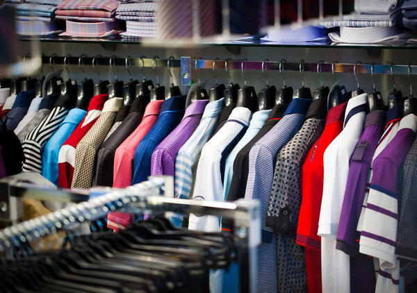 Clothes for men on a hanger in shop