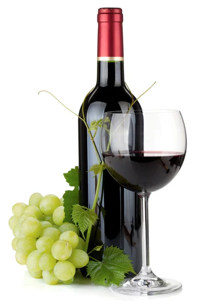 Rotweinglas, Flasche und Trauben — Stockfoto