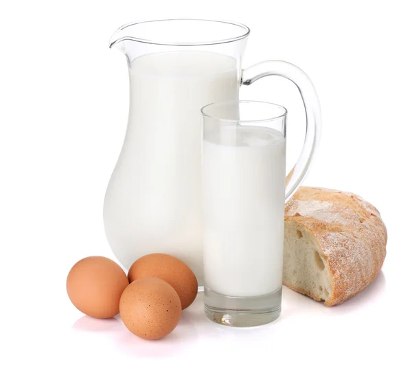 Stock image Milk bottle, glass, eggs and bread