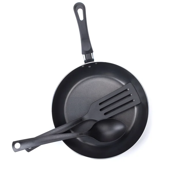 Frying pan with utensils — Stock Photo, Image