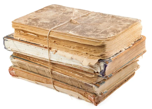 Pila di vecchi libri legati con corda isolata su bianco — Foto Stock