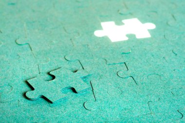 Green puzzle with missing piece clipart