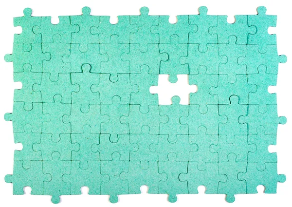 Zelená puzzle s chybějící kousek — Stock fotografie
