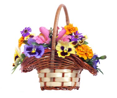 Basket of various flowers on white background clipart