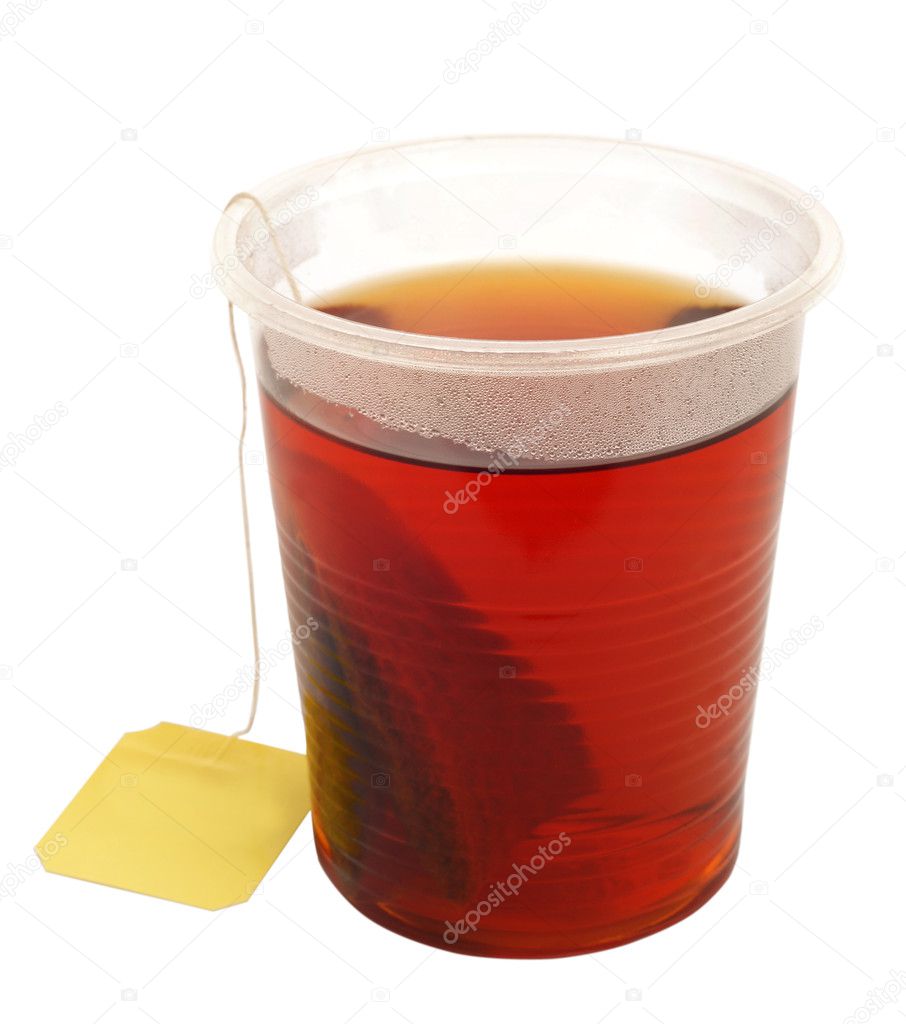 Tea in plastic cup on white background