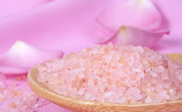 stock image Sea salt and rose petals on pink background