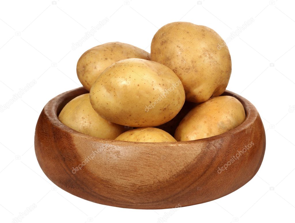 Potatoes in bowl on white background