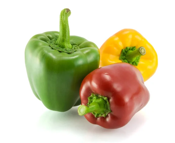 Red, green and yellow sweet pepper on a white background — Stock Photo, Image