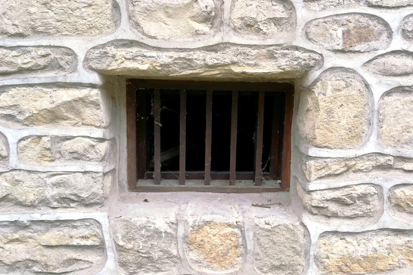 Window with metal lattice — Stock Photo, Image