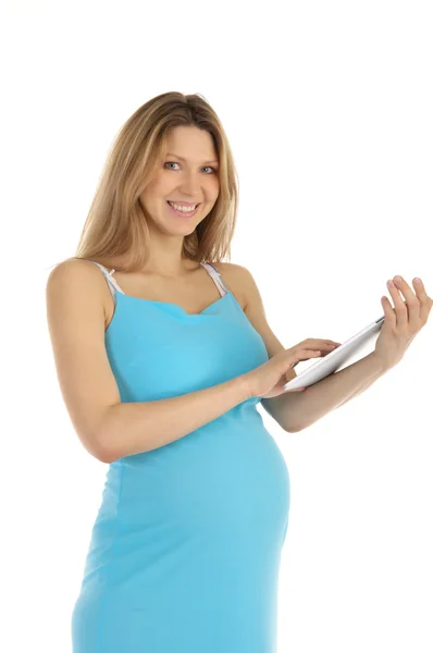 Mulher grávida feliz com comprimido — Fotografia de Stock