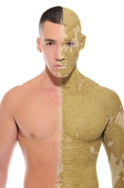Young man half smeared with clay clipart