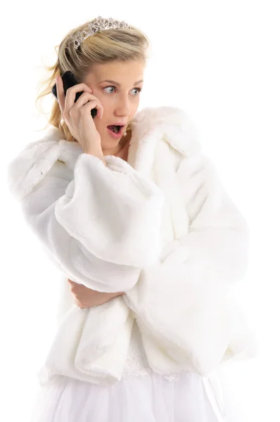 Verrast bruid met telefoon — Stockfoto