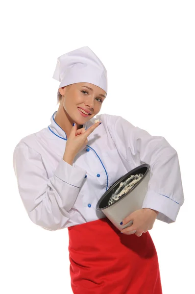 Mujer feliz cocinero tratando de cocinar alimentos — Foto de Stock