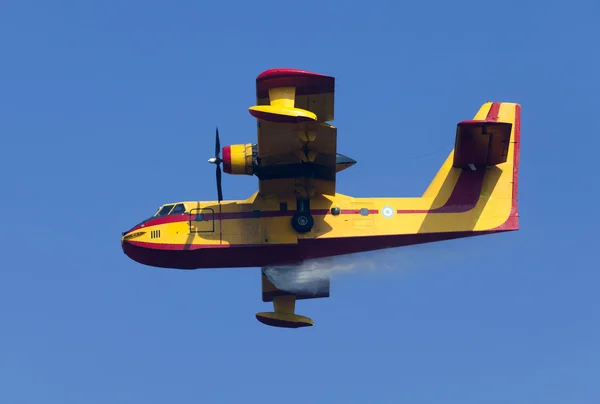 stock image Fire fighting aircraft drops water