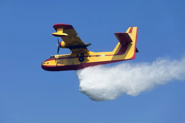 stock image Fire fighting aircraft drops water