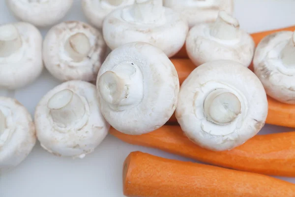 Carrots and mushrooms — Stock Photo, Image