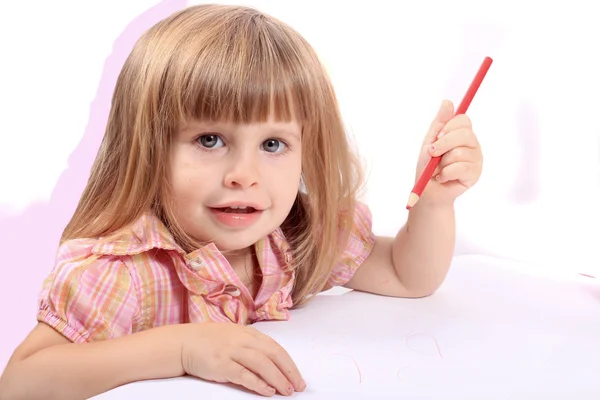 Little girl drawing pictures — Stock Photo, Image