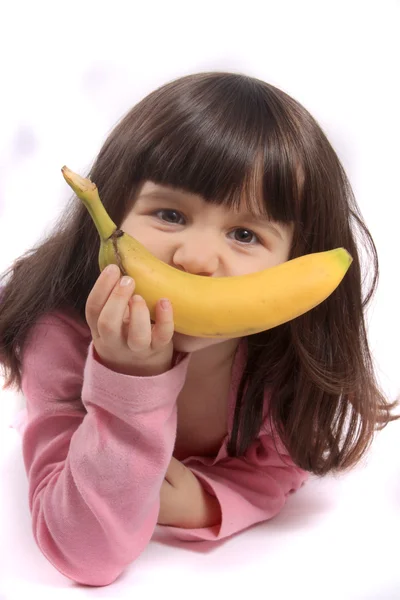 Κοριτσάκι με μπανάνα χαμόγελο — Φωτογραφία Αρχείου