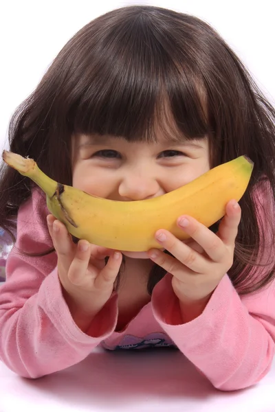 Dziewczynka z bananowy uśmiech — Zdjęcie stockowe