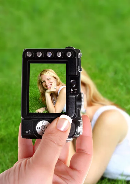 Taking a snapshot of a relaxing woman — Stock Photo, Image
