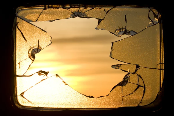 Hole broken screen television sunrise — Stock Photo, Image